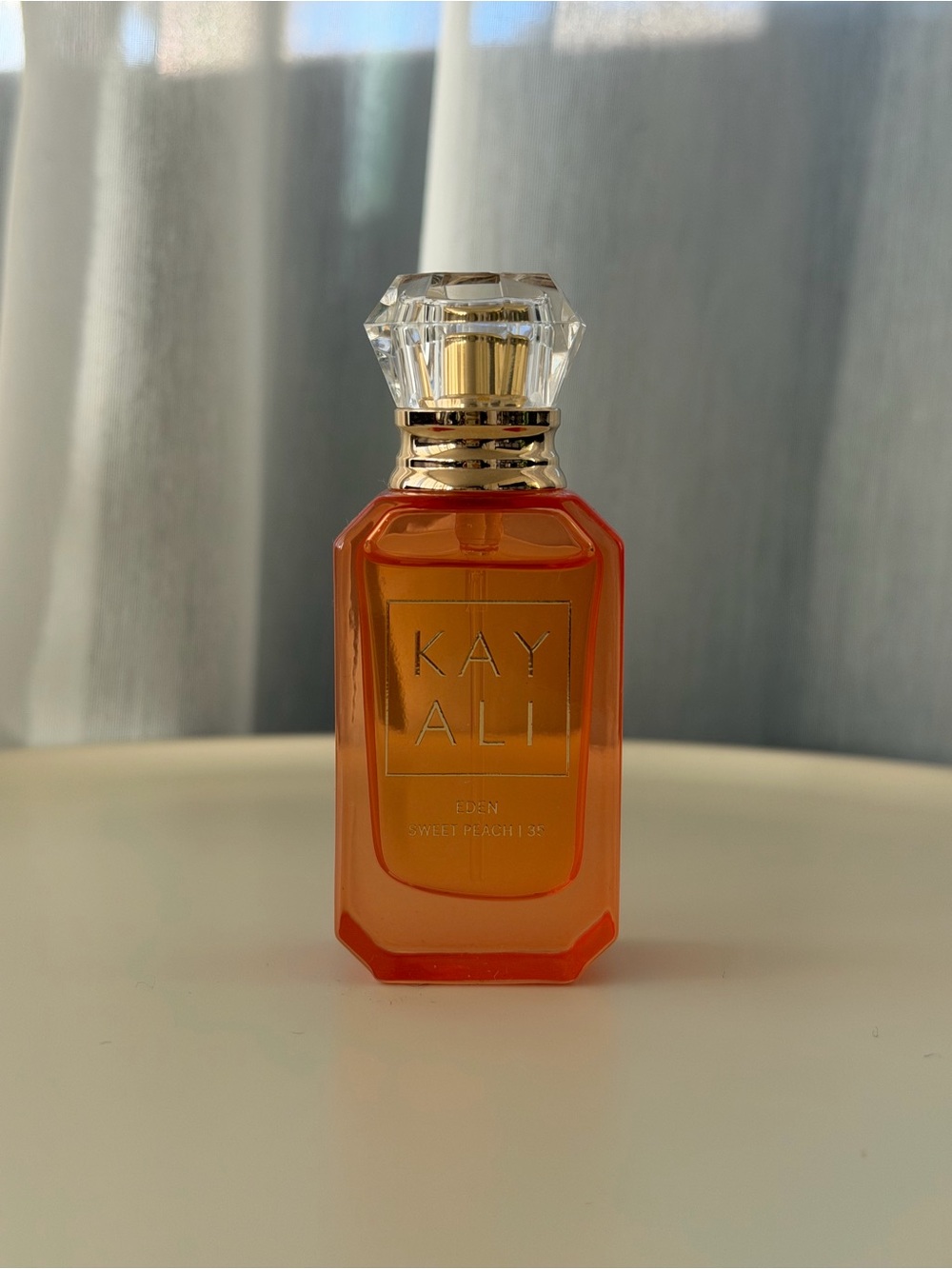 NEW Kayali Eden Sweet Peach 10ml spray  Perfume Bottle - Orange & Gold